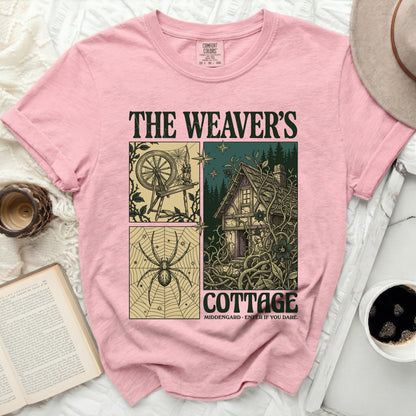 The Weaver's Cottage graphic tee with spinner, spider, and cottage illustrations.