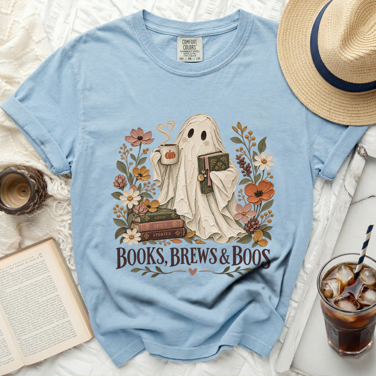 Ghost holding coffee and book surrounded by flowers, with "Books, Brews & Boos" text.