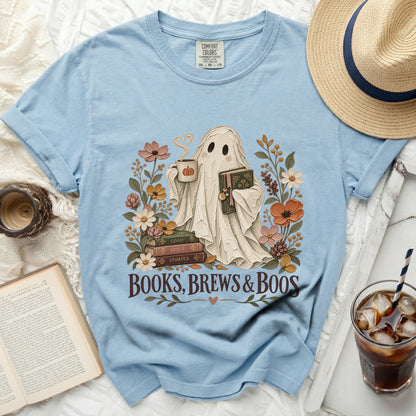 Ghost holding coffee and book surrounded by flowers, with "Books, Brews & Boos" text.