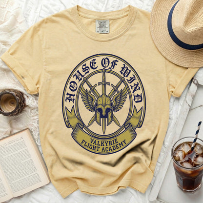 Yellow t-shirt with "House of Wind" and "Valkyrie Flight Academy" logo.