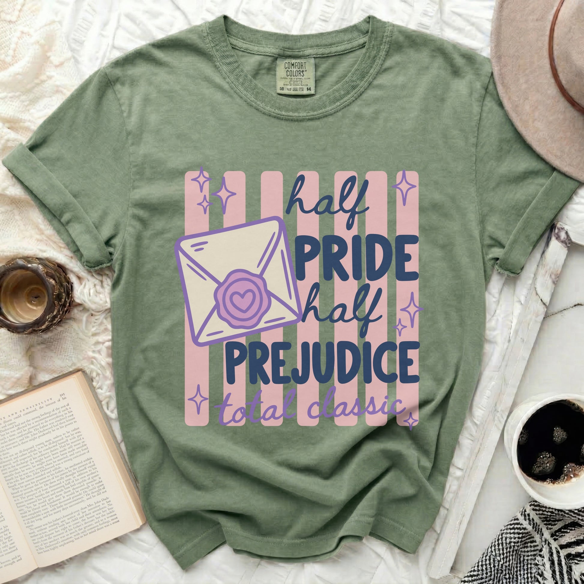 Green t-shirt with "half pride half prejudice total classic" graphic.