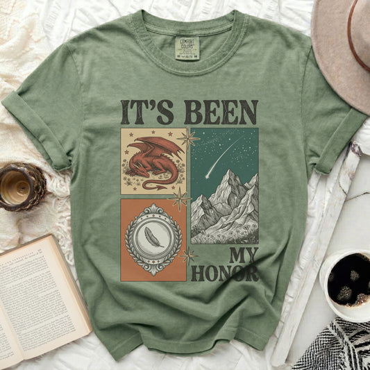 Green t-shirt with "IT'S BEEN MY HONOR" and dragon, feather, and mountain graphics.