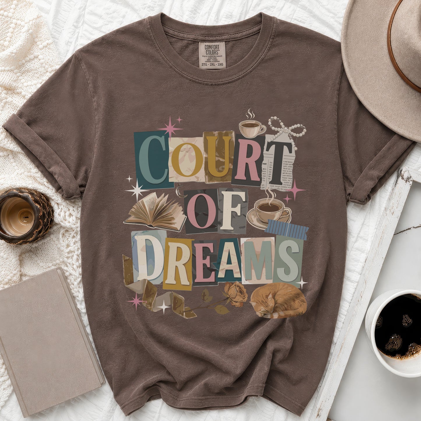 Brown t-shirt with "Court of Dreams" text graphic featuring collage elements.