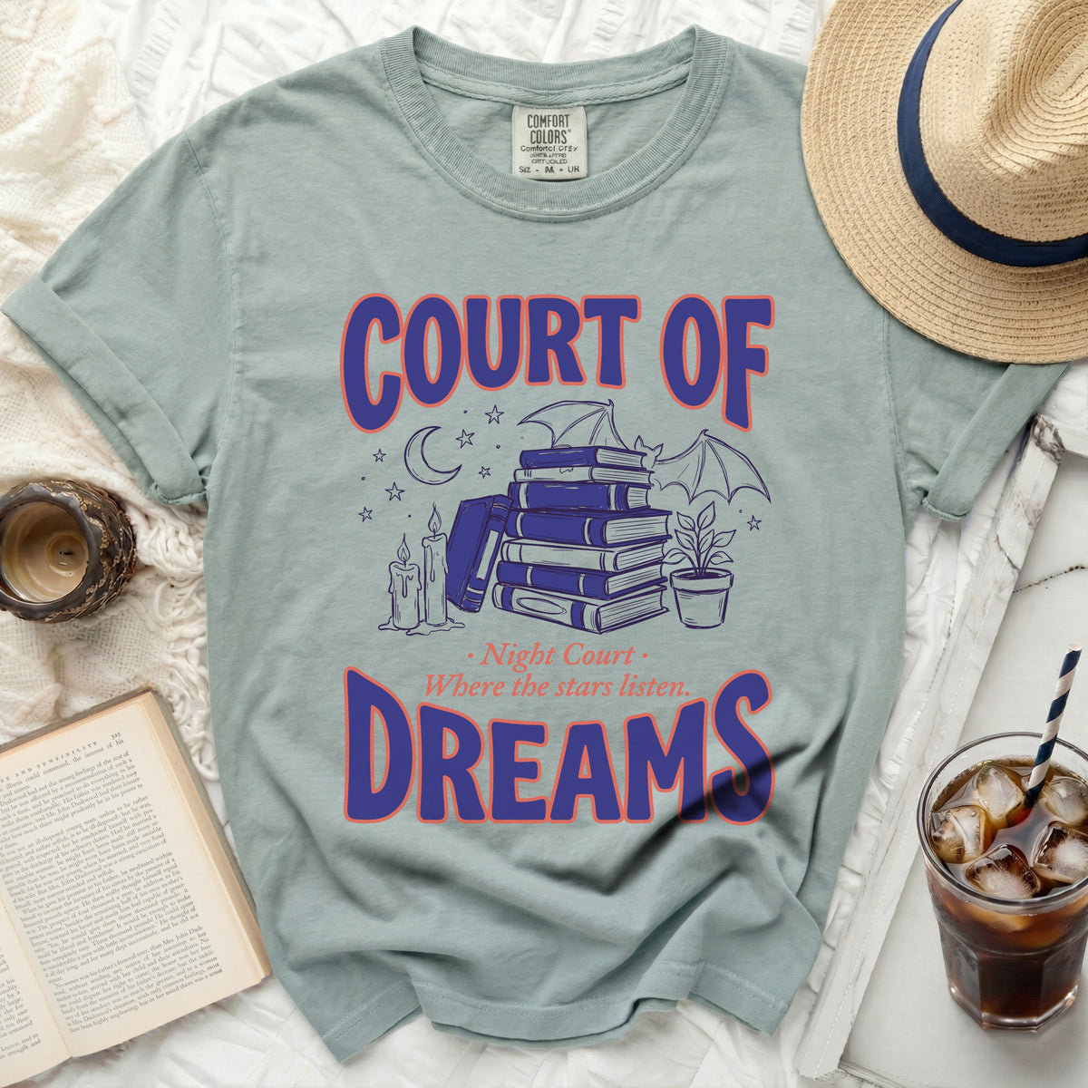 Green t-shirt with "COURT OF DREAMS" and starry night graphic.