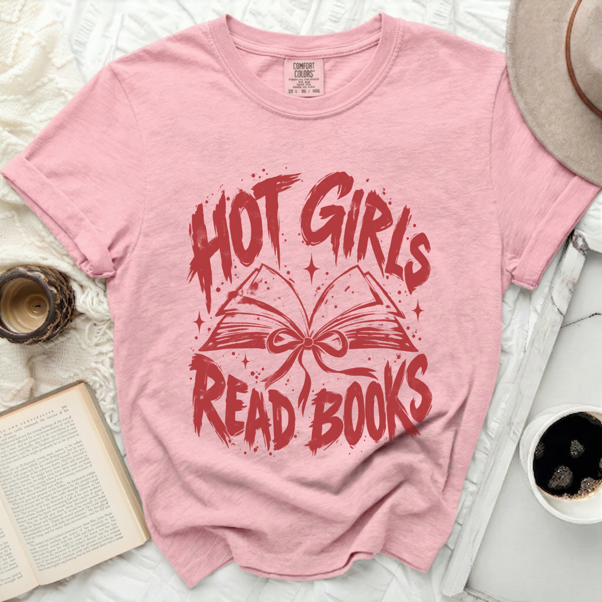 Pink t-shirt with red text "HOT GIRLS READ BOOKS" and an open book graphic.
