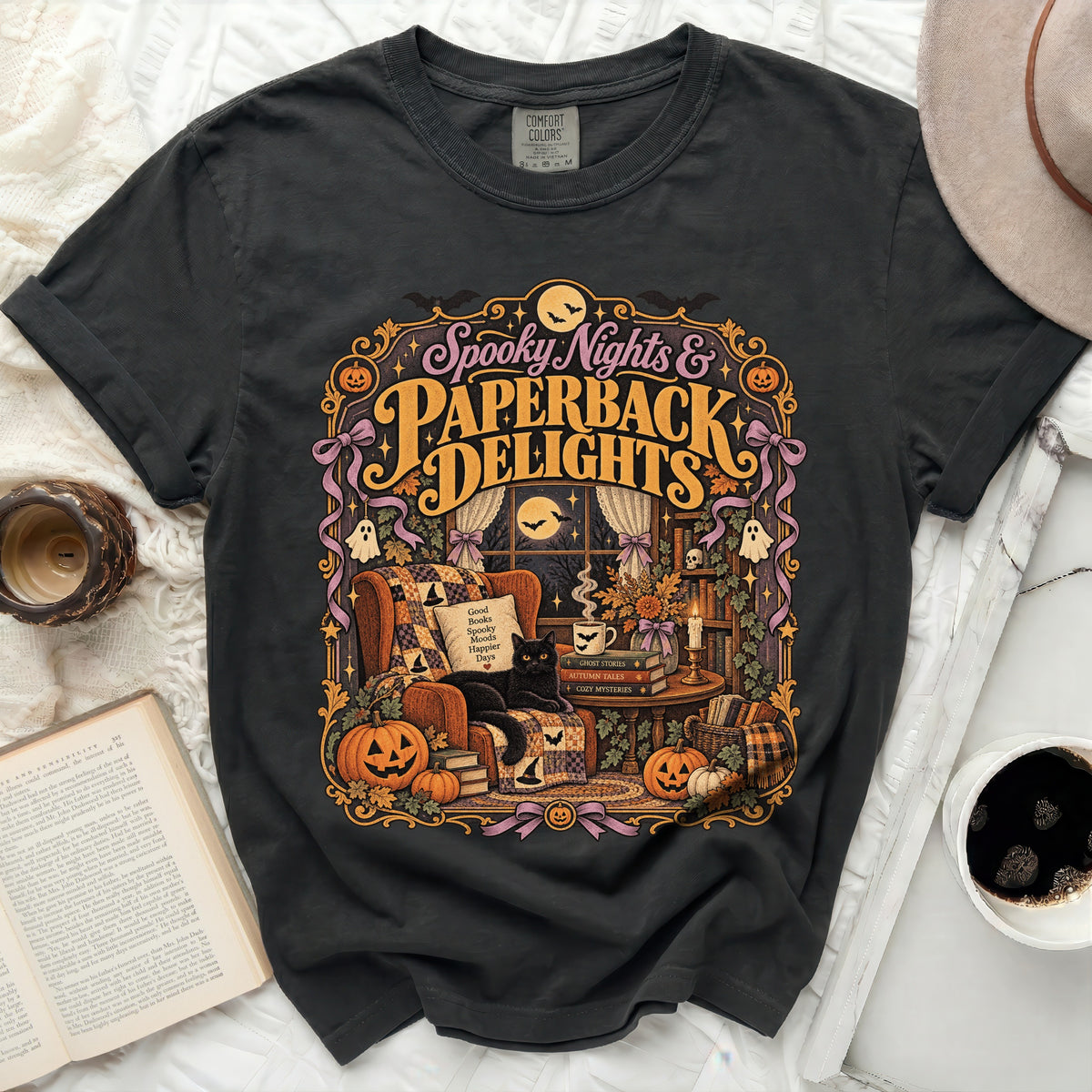 T-shirt with "Spooky Nights & Paperback Delights" Halloween graphic featuring a black cat.
