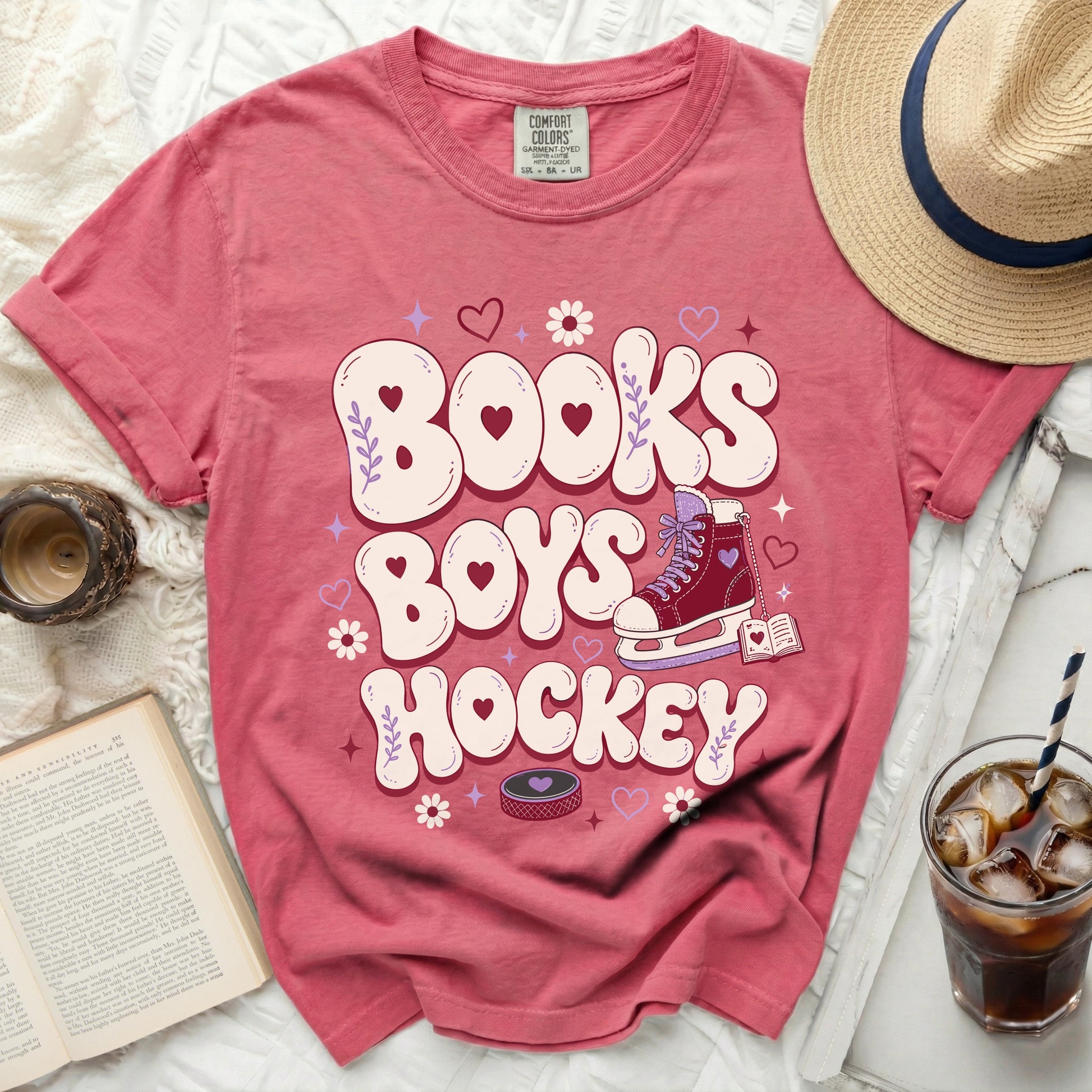 T-shirt with "Books Boys Hockey" text, heart accents, and ice skate.