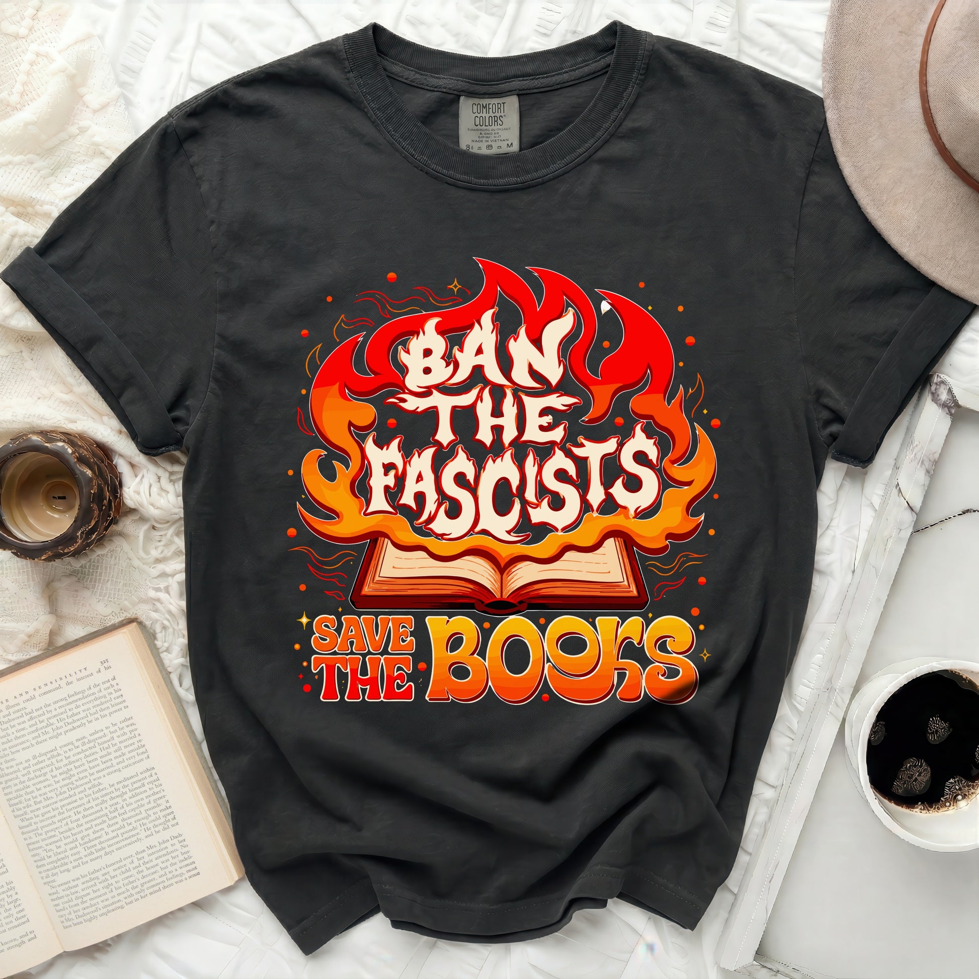 Black t-shirt with "Ban the Fascists Save the Books" graphic and flames.