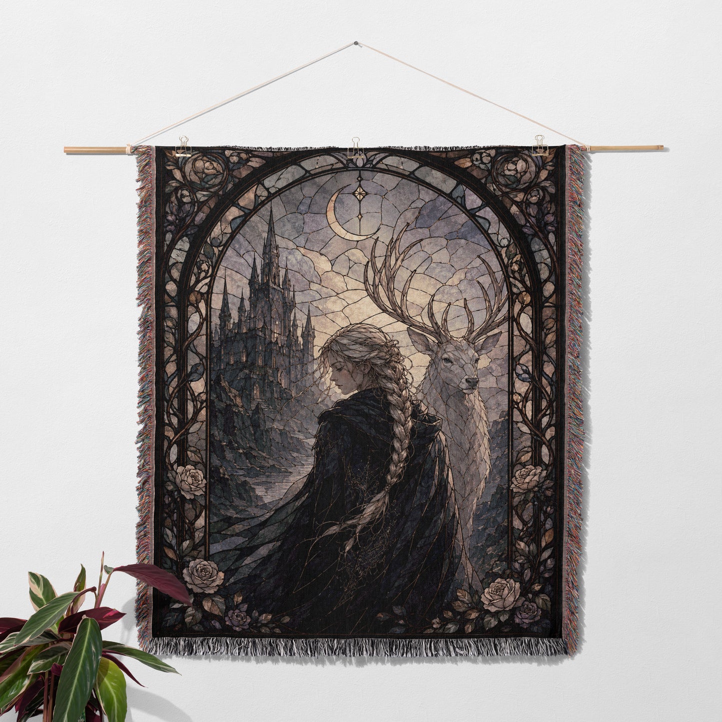 a tapestry hanging on a wall, depicting a woman with long braided hair standing next to a deer.