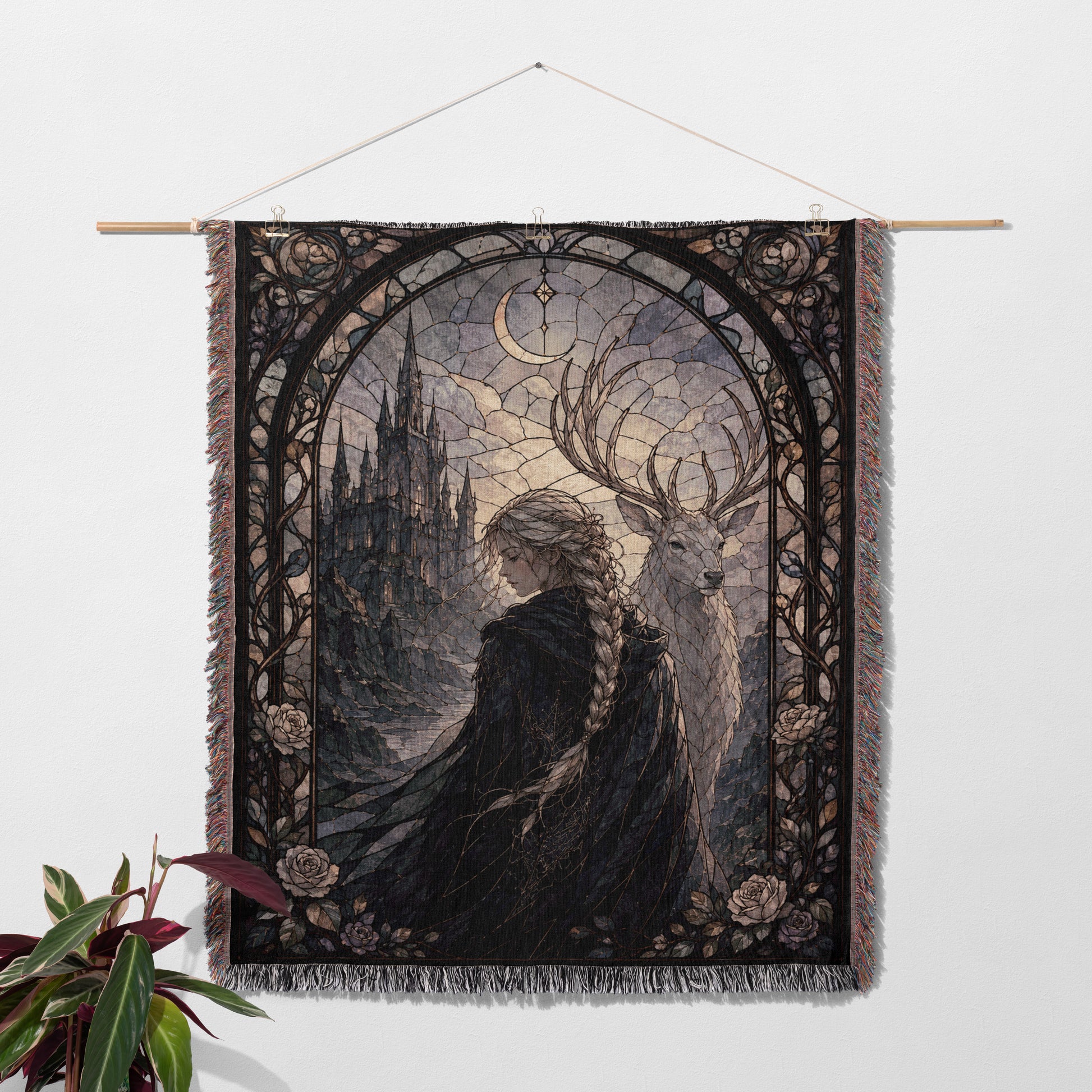 a tapestry hanging on a wall, depicting a woman with long braided hair standing next to a deer.