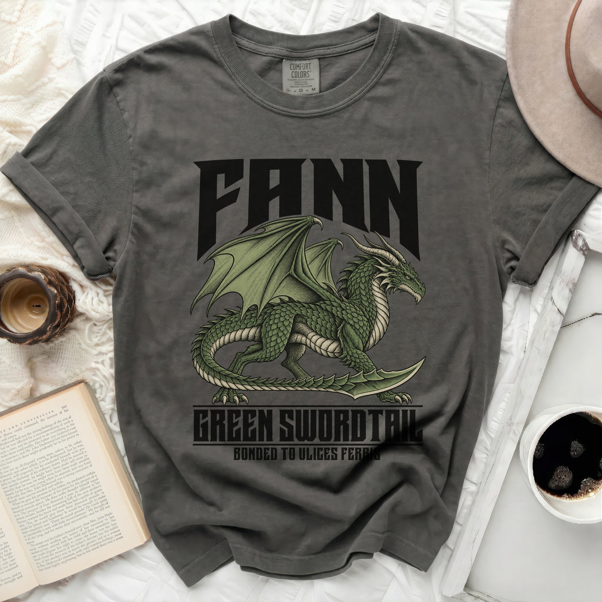 Charcoal t-shirt with a green dragon graphic and text FANN, GREEN SWORDTAIL, BONDED TO ULICES FERRIS.
