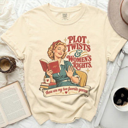Cream t-shirt with graphic of woman reading, "Plot Twists & Women's Rights" text.