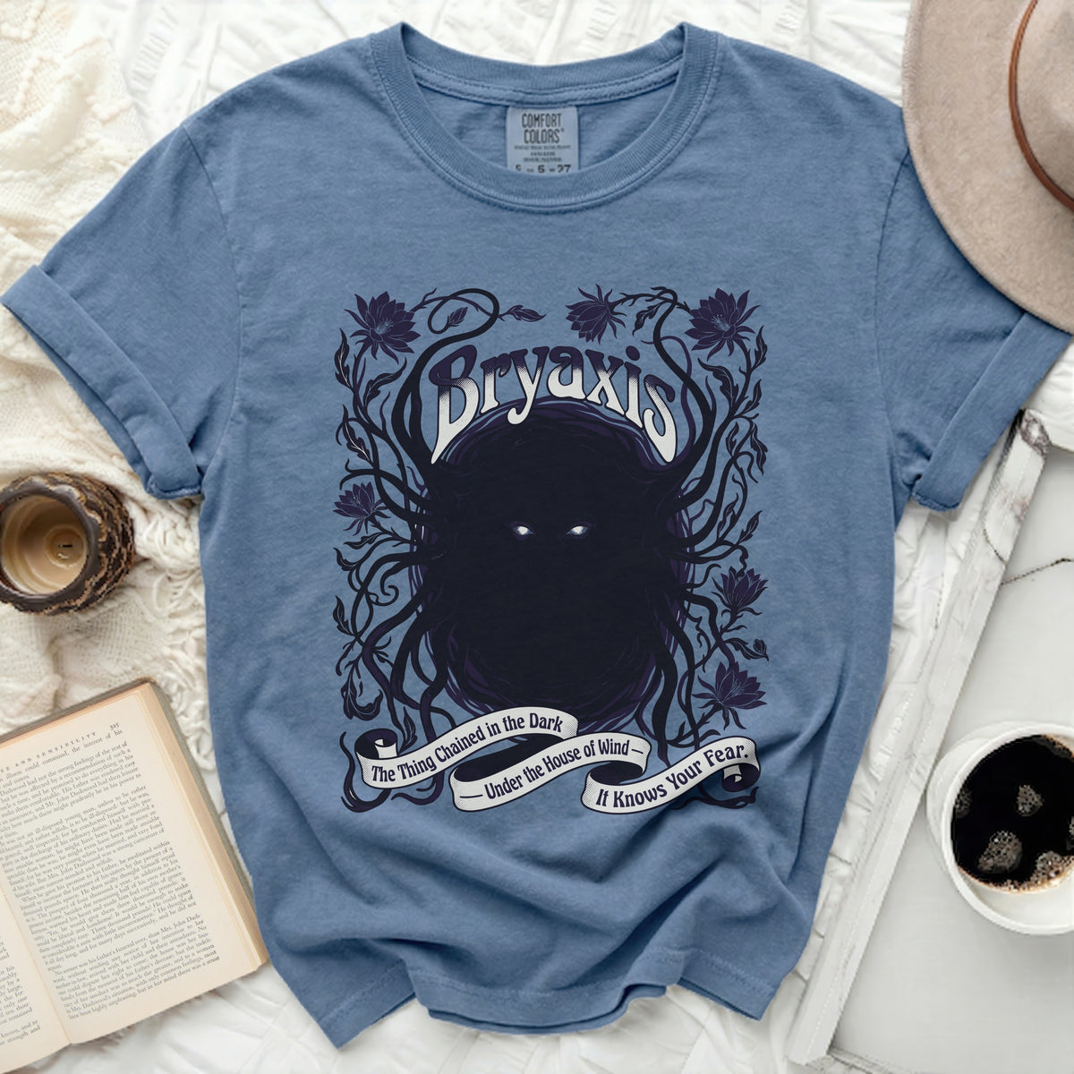 Bryaxis t-shirt with dark floral design and text "The Thing Chained in the Dark".