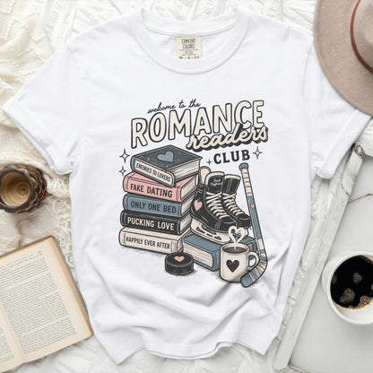White t-shirt with "Romance Readers Club" design and book titles.