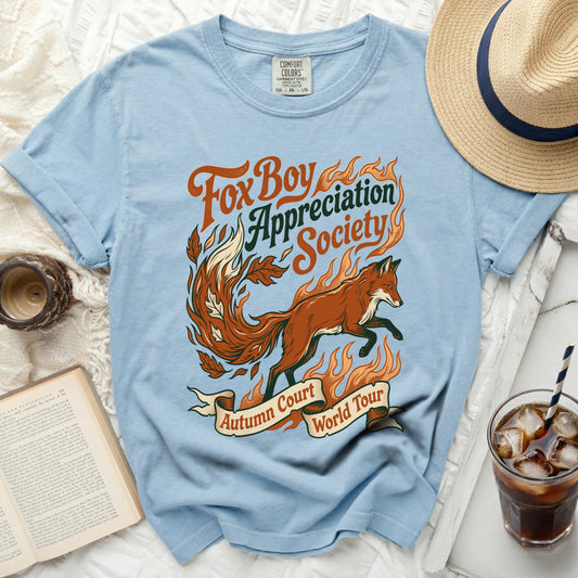 Light blue t-shirt with "Fox Boy Appreciation Society Autumn Court World Tour" graphic.