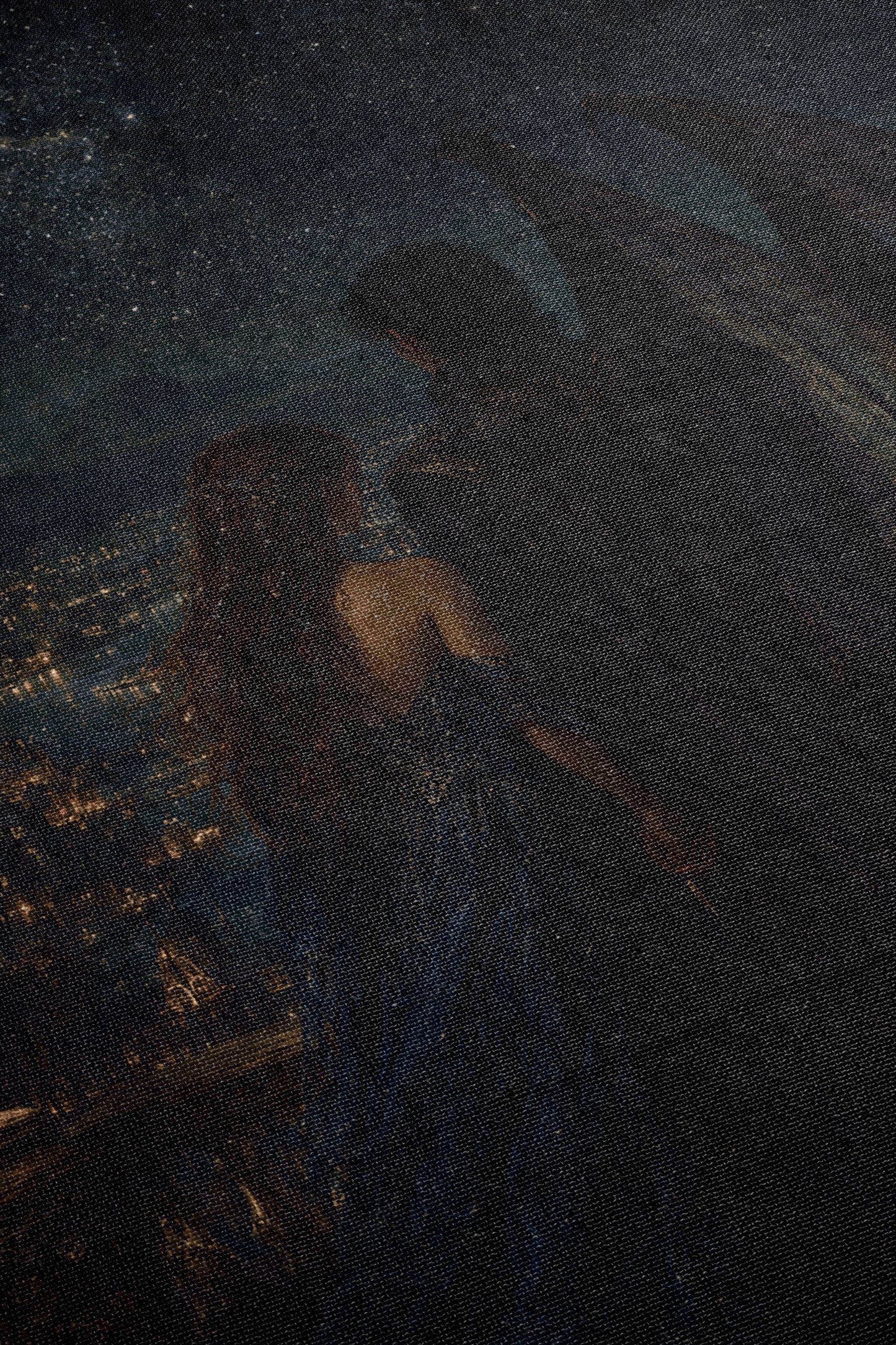 a woman with long, flowing hair standing in a dark, moody setting, with a cityscape visible in the background.