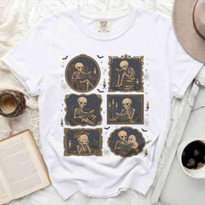 White t-shirt with six framed illustrations of skeletons reading and a hat.