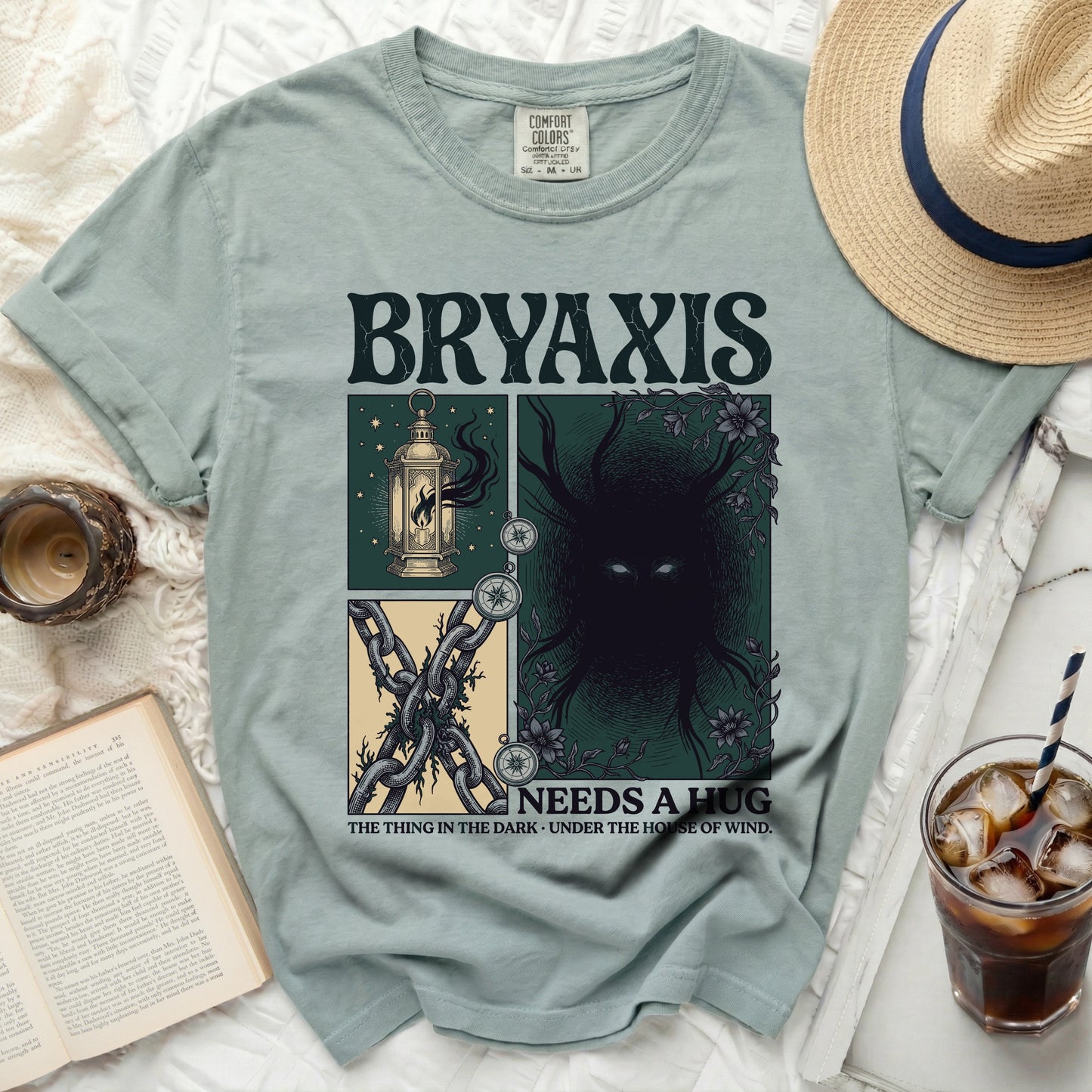 Green t-shirt with "BRYAXIS NEEDS A HUG" and dark fantasy art.