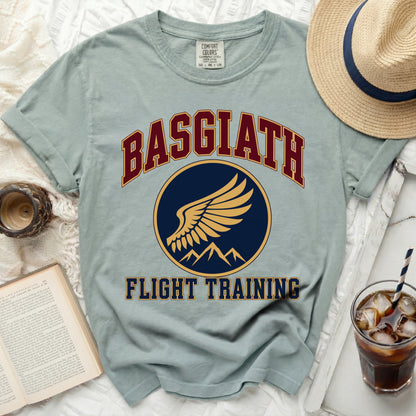 Light blue t-shirt with "BASGIATH FLIGHT TRAINING" graphic and winged emblem.