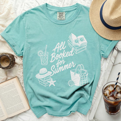 All Booked for Summer graphic t-shirt with beach accessories.