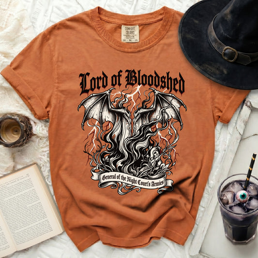 Orange t-shirt with "Lord of Bloodshed, General of the Night Court's Armies" graphic.