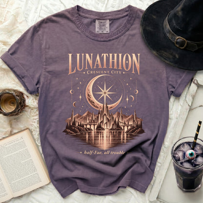 Purple t-shirt with "Lunathion Crescent City" and a celestial cityscape design.