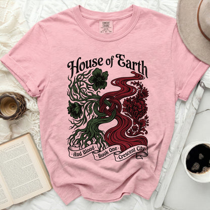 Pink t-shirt with "House of Earth and Blood Book One Crescent City" graphic.