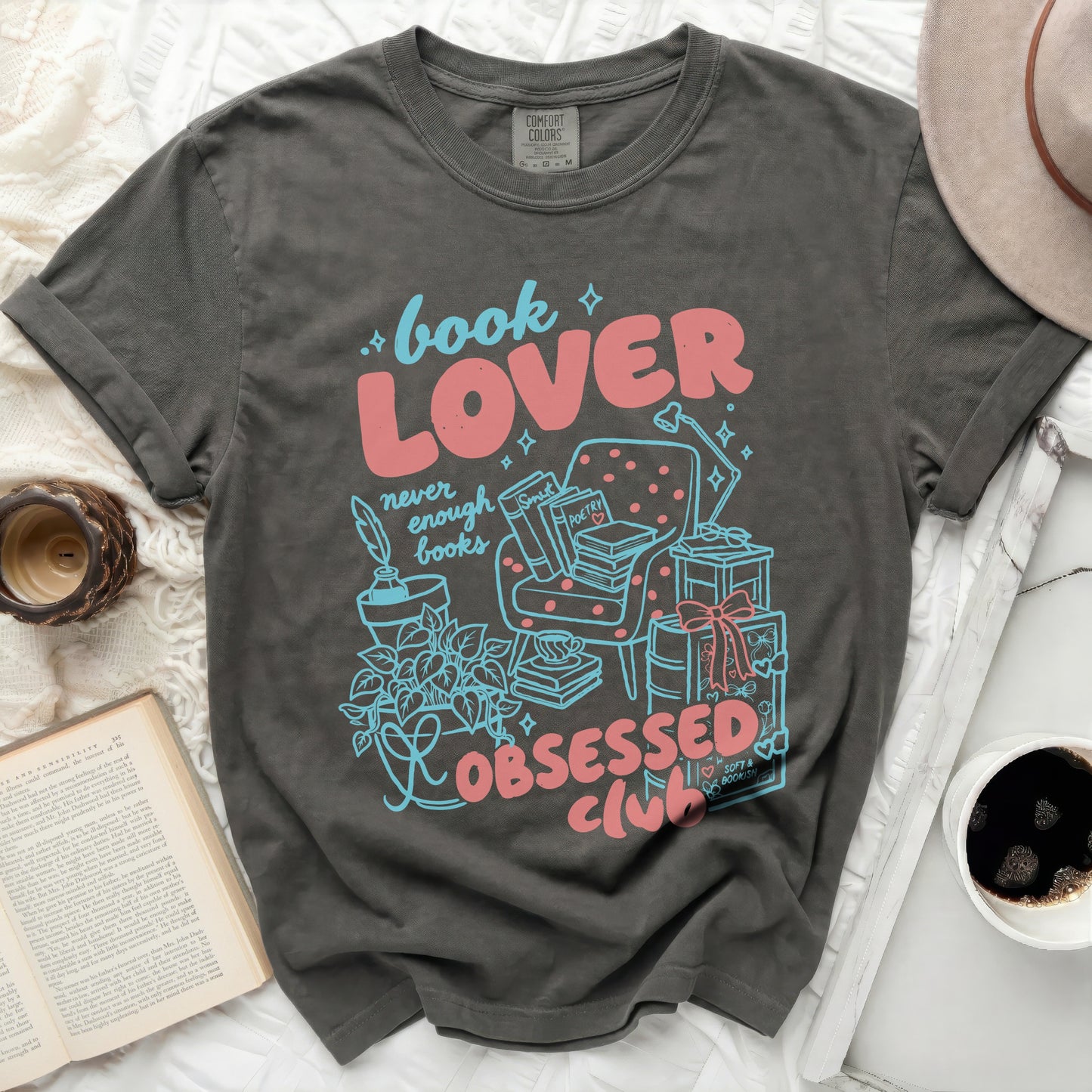 Dark grey t-shirt with "book LOVER" and "OBSESSED club" in pink and blue.
