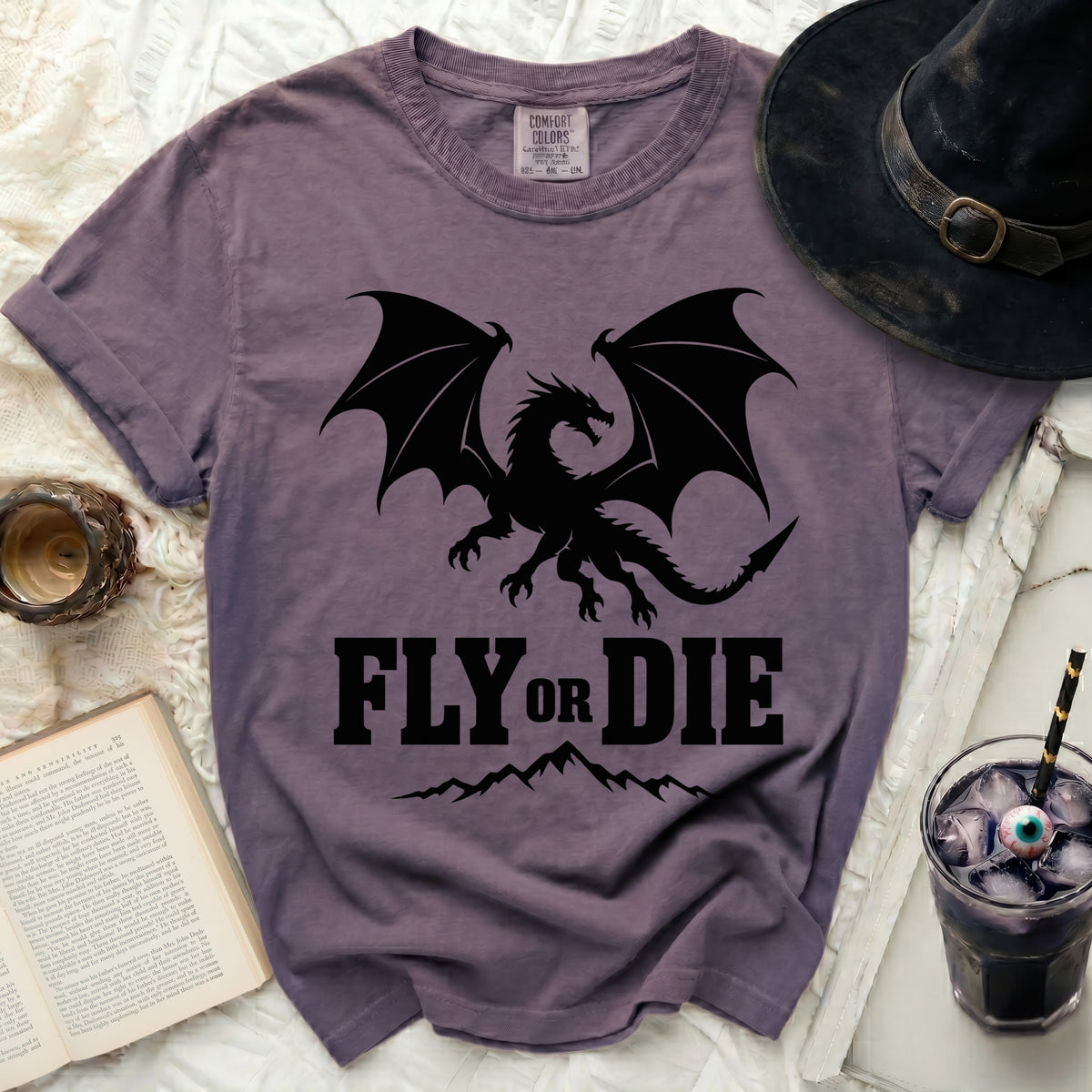 Purple t-shirt with black dragon graphic and "FLY OR DIE" text.
