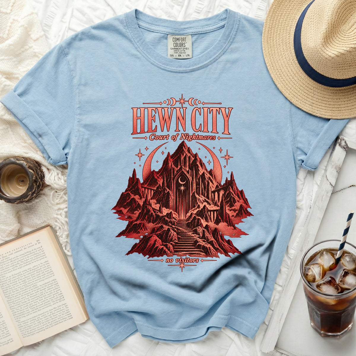 Light blue t-shirt with "HEWN CITY Court of Nightmares no visitors" graphic.