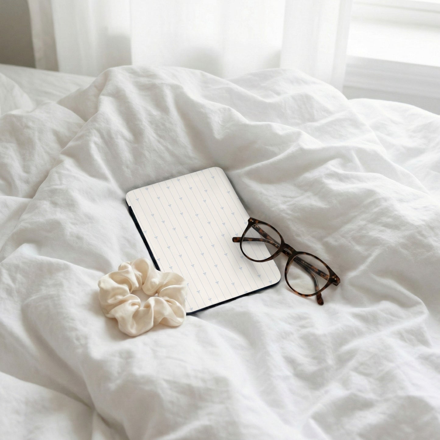 Cozy Bedtime Essentials with Tablet and Glasses