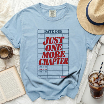Light blue t-shirt with "DATE DUE" and "JUST ONE MORE CHAPTER" text.