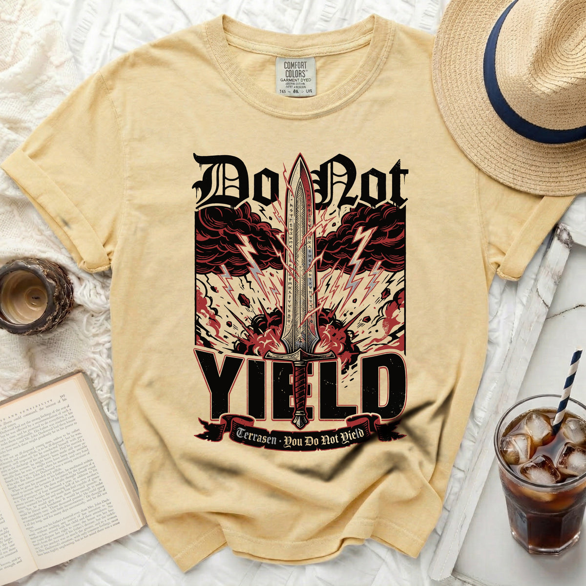 Yellow t-shirt with "Do Not Yield" sword graphic and lightning.