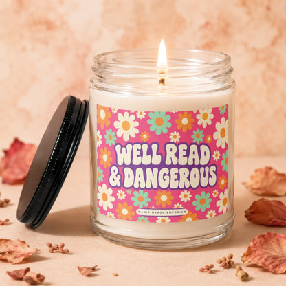 Candle with "Well Read & Dangerous" text and retro flower design.