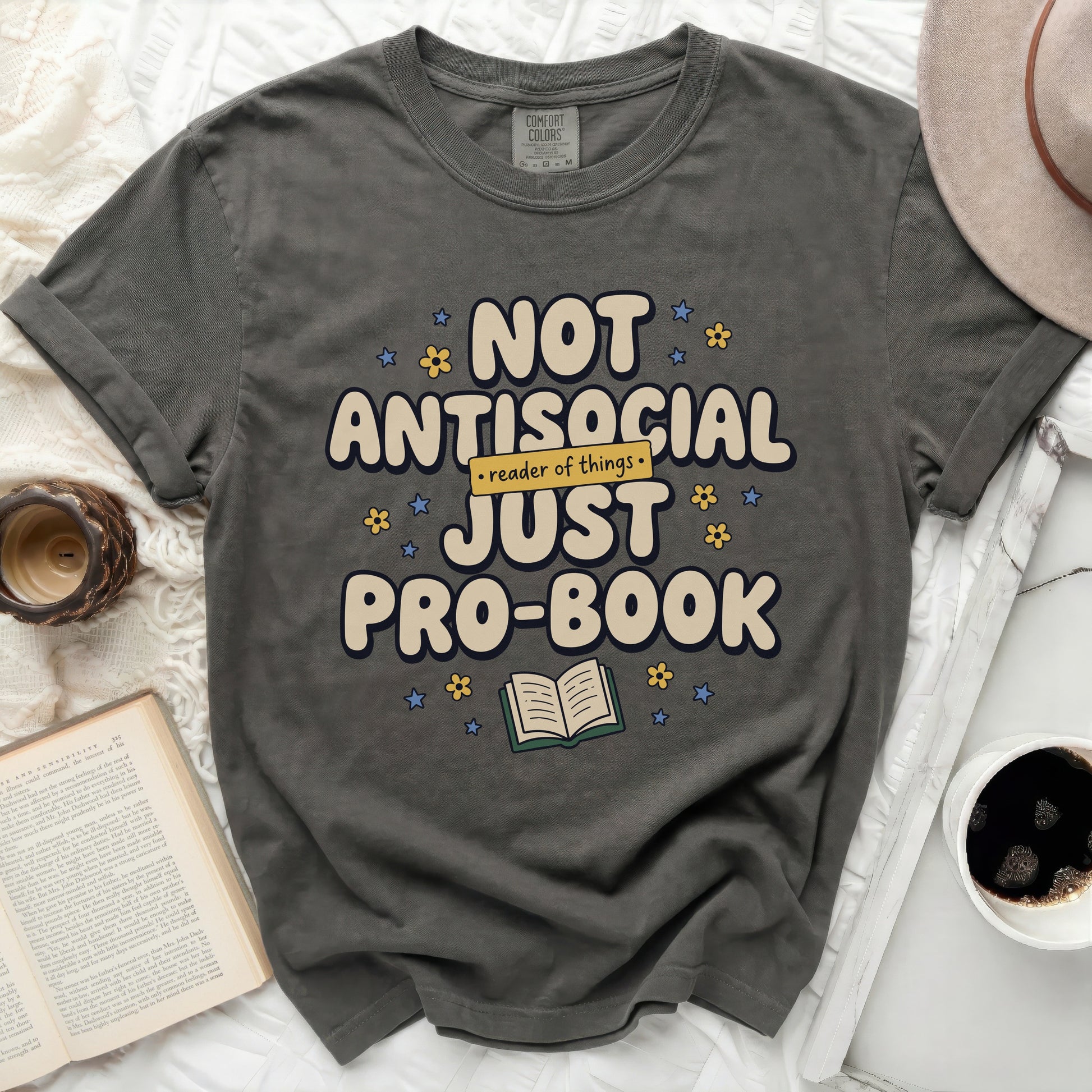 Dark t-shirt with "Not Antisocial, Just Pro-Book" graphic and small books.