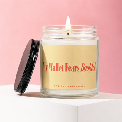 Jar candle with lit wick, yellow label reads "My Wallet Fears BookTok"