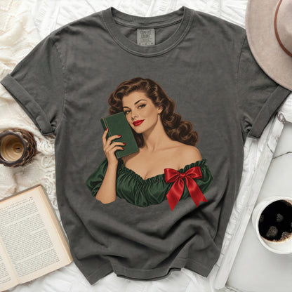 Gray t-shirt with vintage pin-up art of woman holding book and wearing red bow.