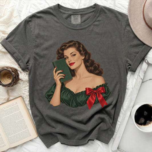 Gray t-shirt with vintage pin-up art of woman holding book and wearing red bow.
