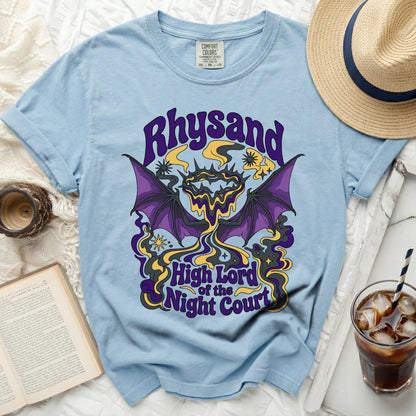 Light blue t-shirt with "Rhysand High Lord of the Night Court" graphic.