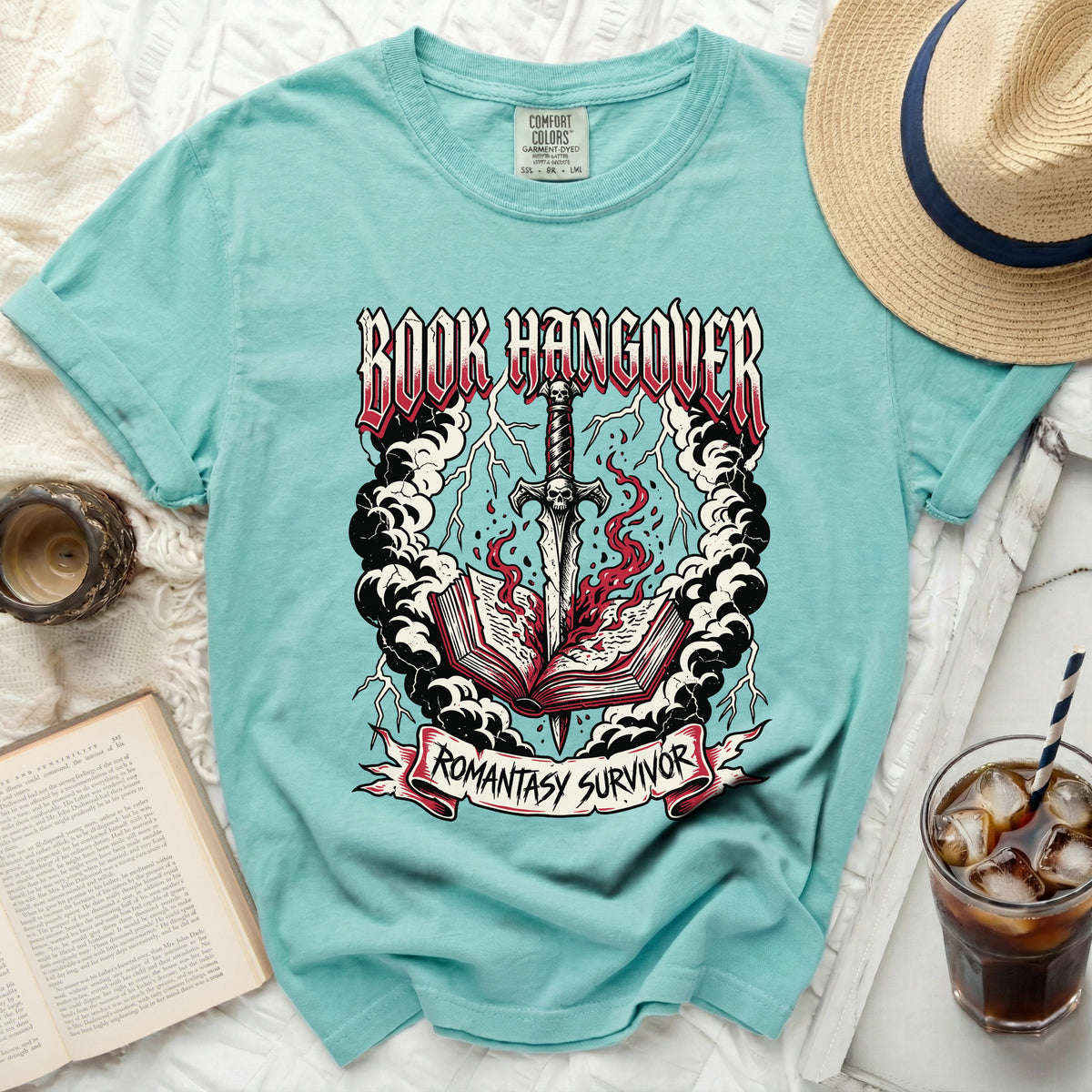 Teal t-shirt with "Book Hangover" and "Romantasy Survivor" graphic.