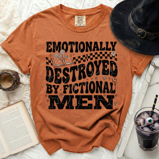 Orange t-shirt with black text "Emotionally Destroyed By Fictional Men".