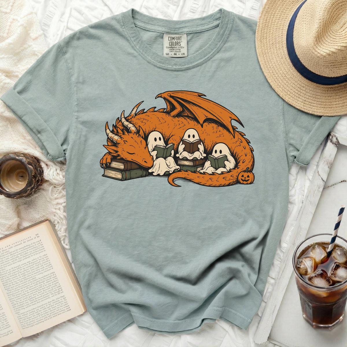 Teal Comfort Colors t-shirt with a dragon and three ghosts reading books graphic.