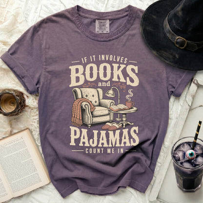 Purple t-shirt with "If it involves books and pajamas count me in" graphic.