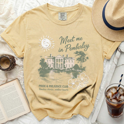 Yellow t-shirt with "Meet me in Pemberley" graphic and Pemberley house.
