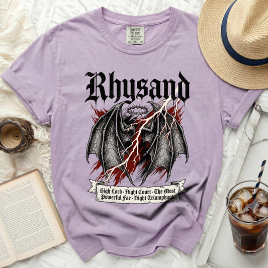Purple t-shirt with black gothic text and dragon wings graphic.