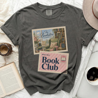 Dark grey t-shirt with "The Bookstore" and "Always Open Book Club" graphic.