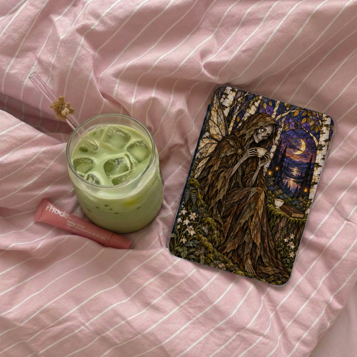 Phone case featuring grim reaper figure holding tea by moonlit forest scene.