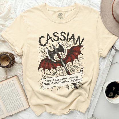 Cream t-shirt with "Cassian Lord of Bloodshed General Night Court Illyrian Prythian" text and an axe.