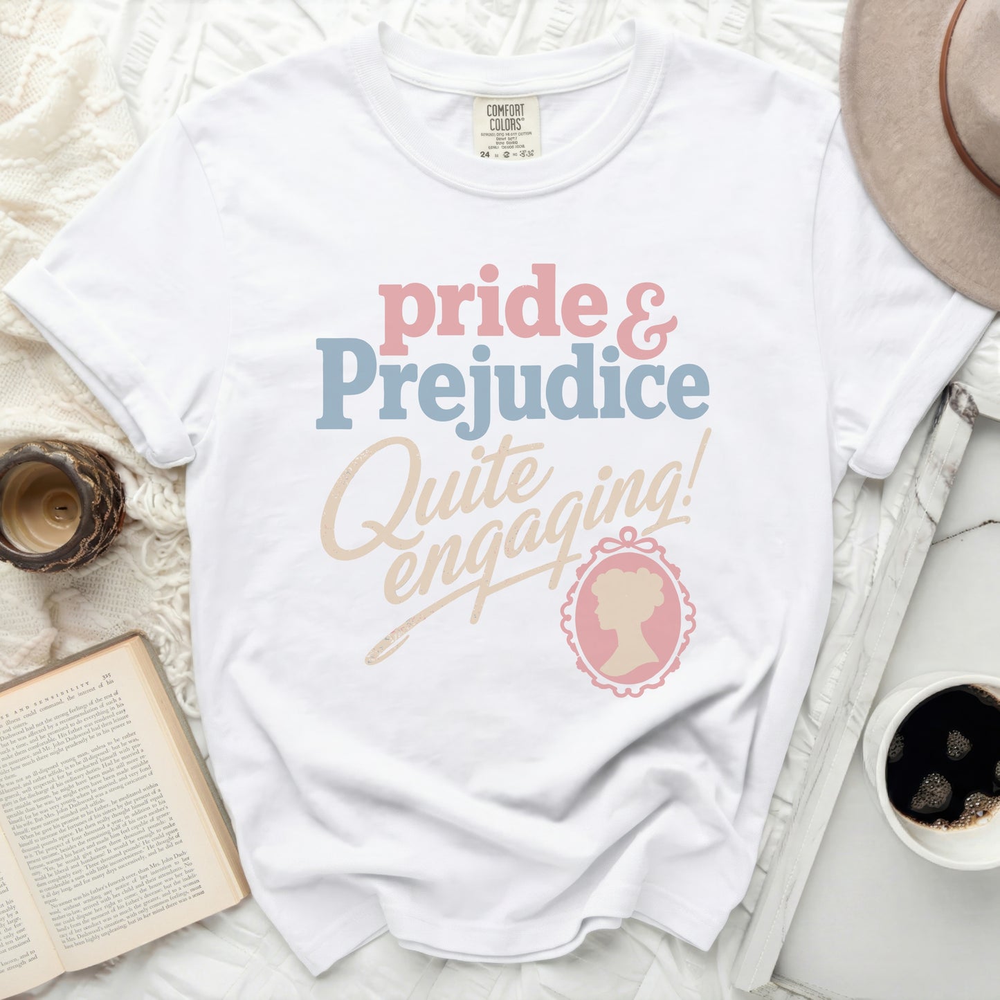 White t-shirt with "Pride & Prejudice" and "Quite Engaging!" graphic.