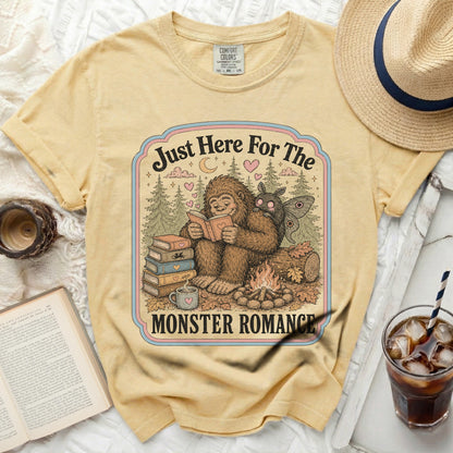 Bigfoot and moth reading books by campfire, "Just Here For The Monster Romance" on t-shirt.